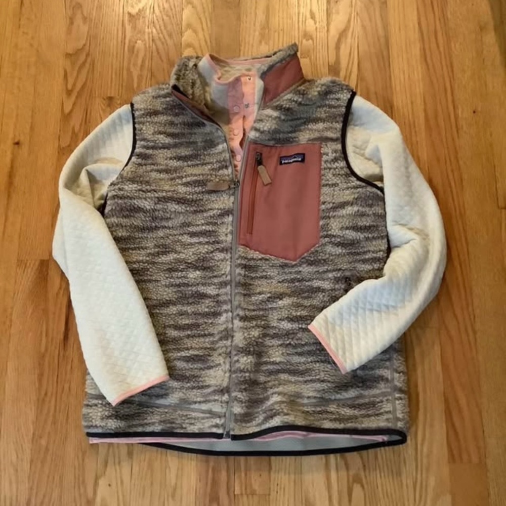 The vest is super cute. The pullover is NOT Patagonia brand and is free:)
